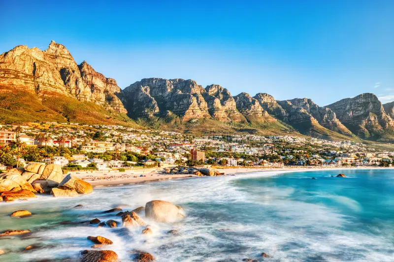 cape-town-sunset-over-camps-bay-beach-table-mountain-twelve-apostles-background-south-africa-keywords-landscape-362402827